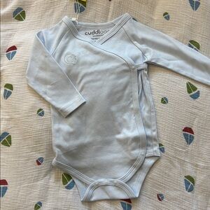 8. Light Blue Baby Onesie
